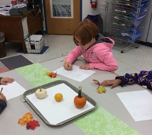 Second graders work hard on autumn art project