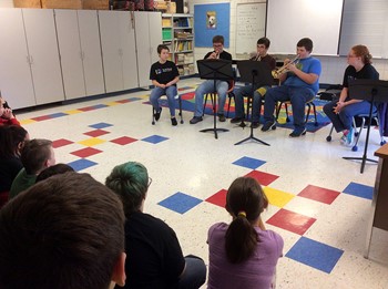 Tri-M Music Honor Society performs for community, students