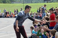 Circle of athletes during homecoming week